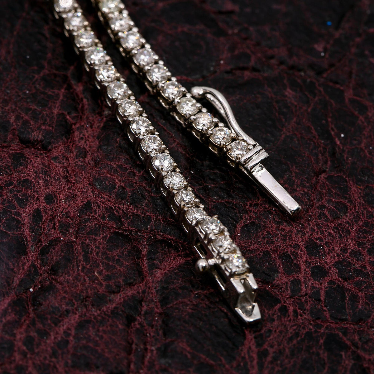 14K White Gold Men's Tennis Chain With 10.00 CT Diamonds shown around neck