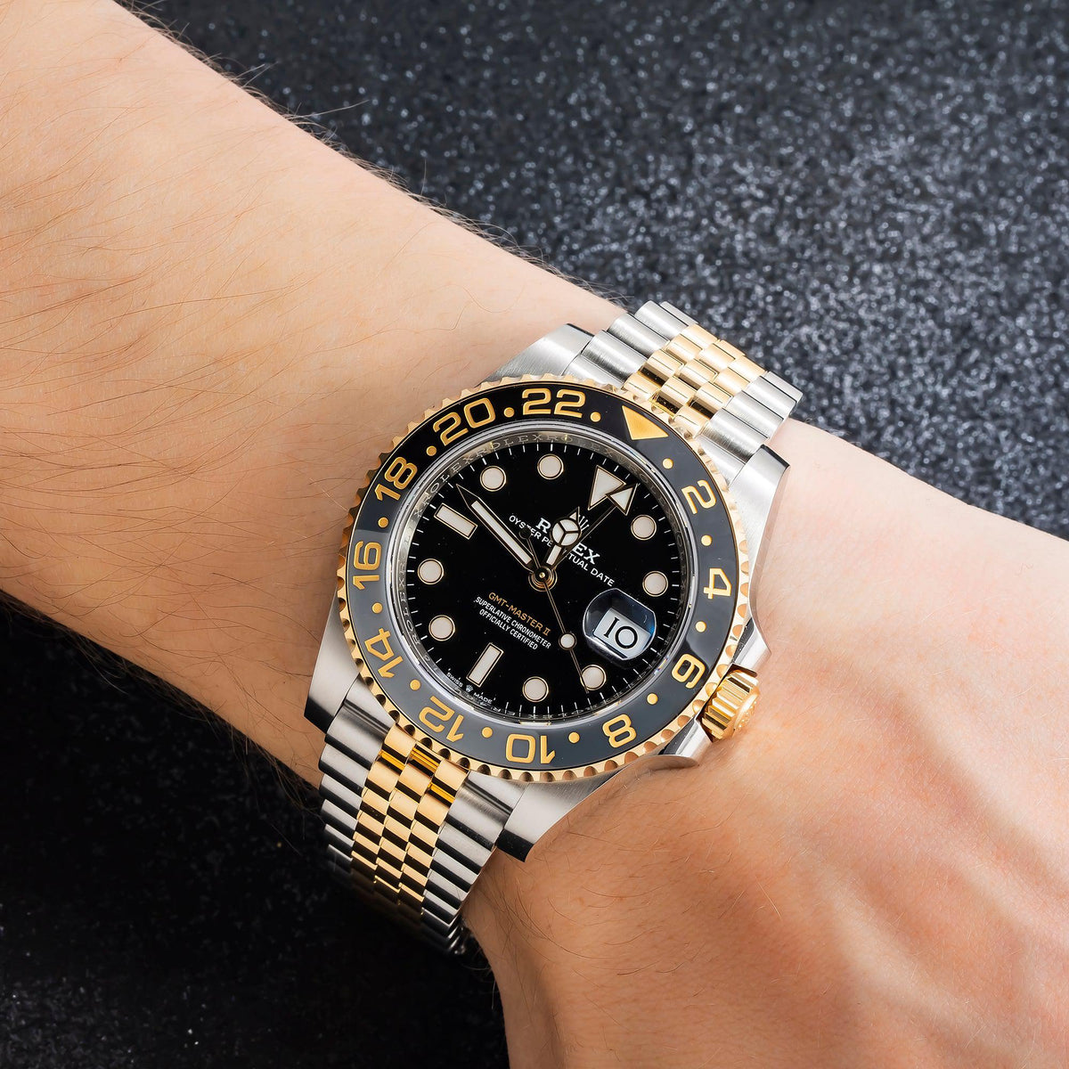 Rolex GMT-Master II 40MM 126713GRNR Zombie Black Dial Black Ceramic Bezel Two Tone Yellow Gold Jubilee Bracelet worn on wrist