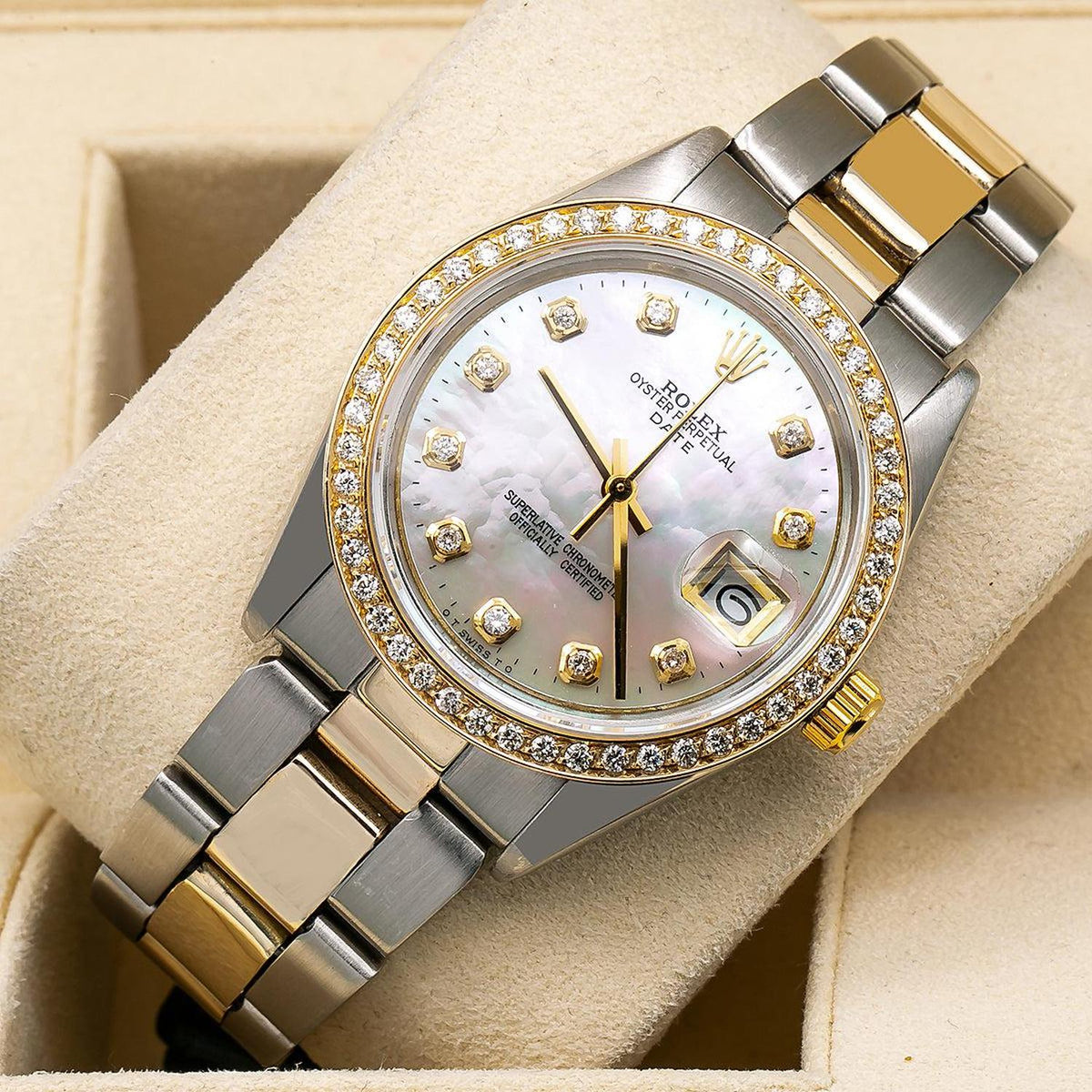 Rolex Date 34MM 1505 White Mother of Pearl Diamond Dial Diamond Bezel Two Tone Yellow Gold Oyster Bracelet 1.2ct detail view