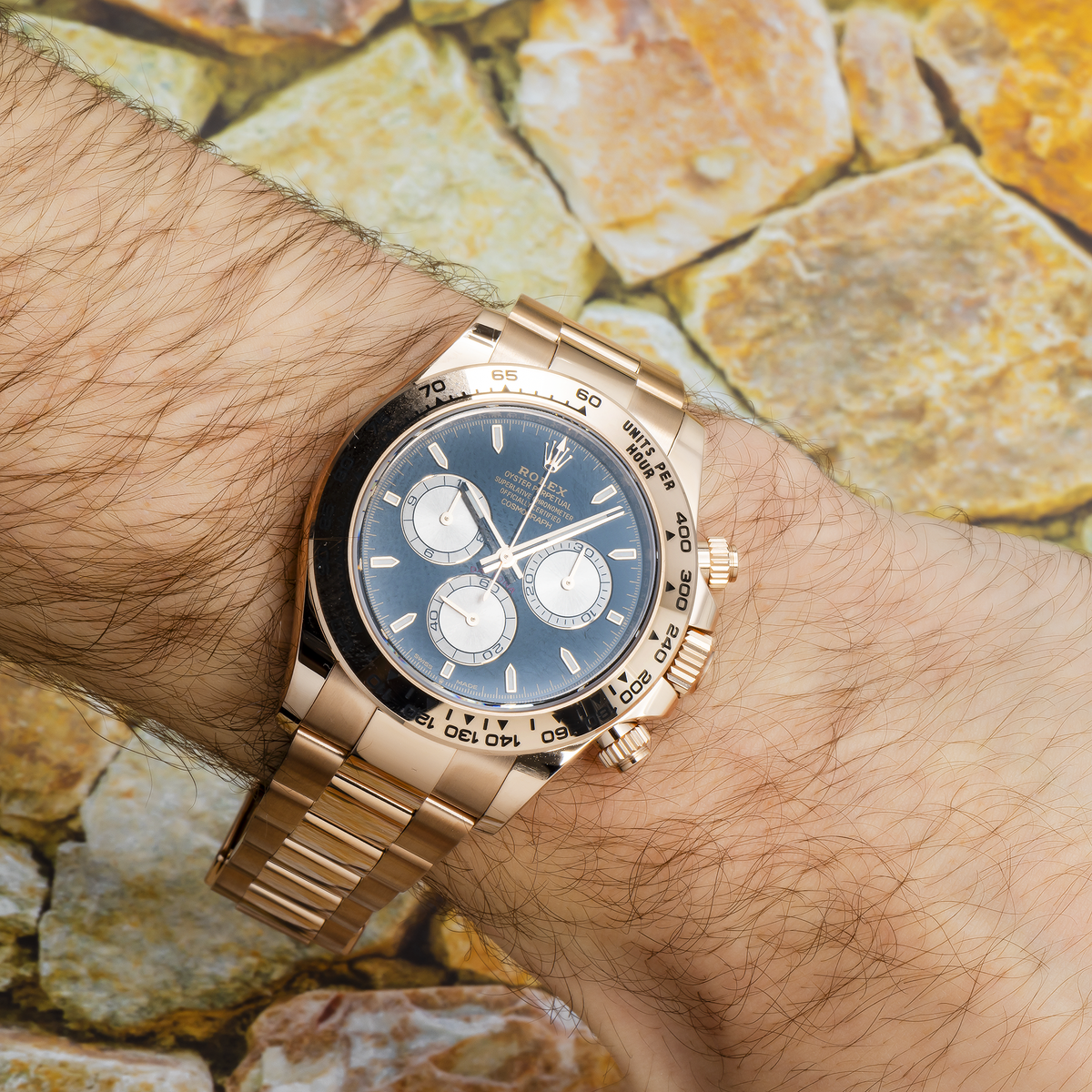 Rolex Cosmograph Daytona 40MM 126505 Black Dial Tachymeter Bezel 18K Rose Gold Oyster Bracelet worn on wrist