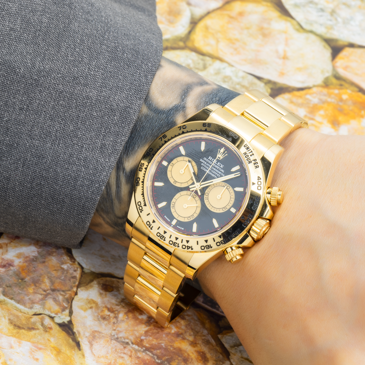 Rolex Daytona 40MM 126508 Paul Newman Black Dial Tachymeter Bezel 18K Yellow Gold Oyster Bracelet worn on wrist