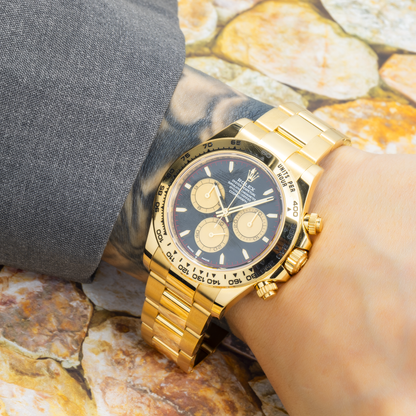 Rolex Daytona 40MM 126508 Paul Newman Black Dial Tachymeter Bezel 18K Yellow Gold Oyster Bracelet worn on wrist