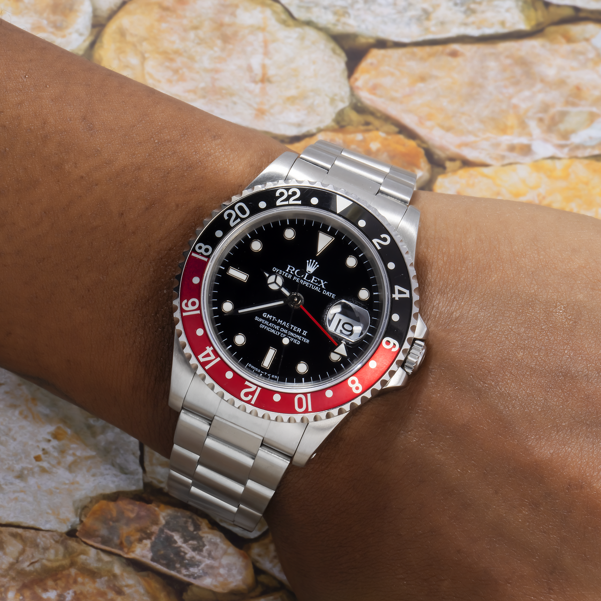 Rolex GMT-Master II 40MM 16710 Coke Black Dial Black & Red Ceramic Bezel Stainless Steel Oyster Bracelet worn on wrist
