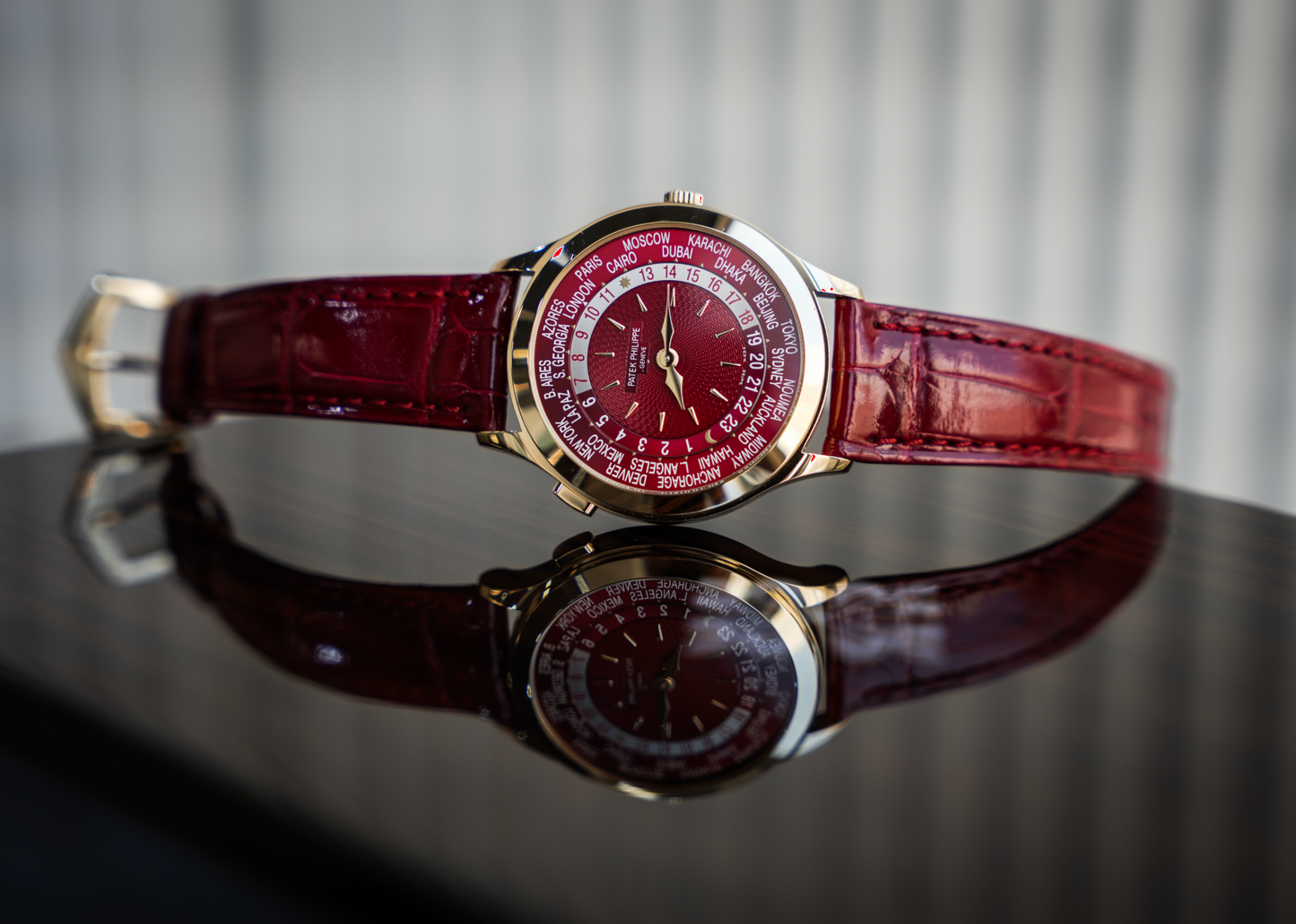 Patek Philippe Complications World Time 7129J-001 18K Yellow Gold Carmine Red Dial