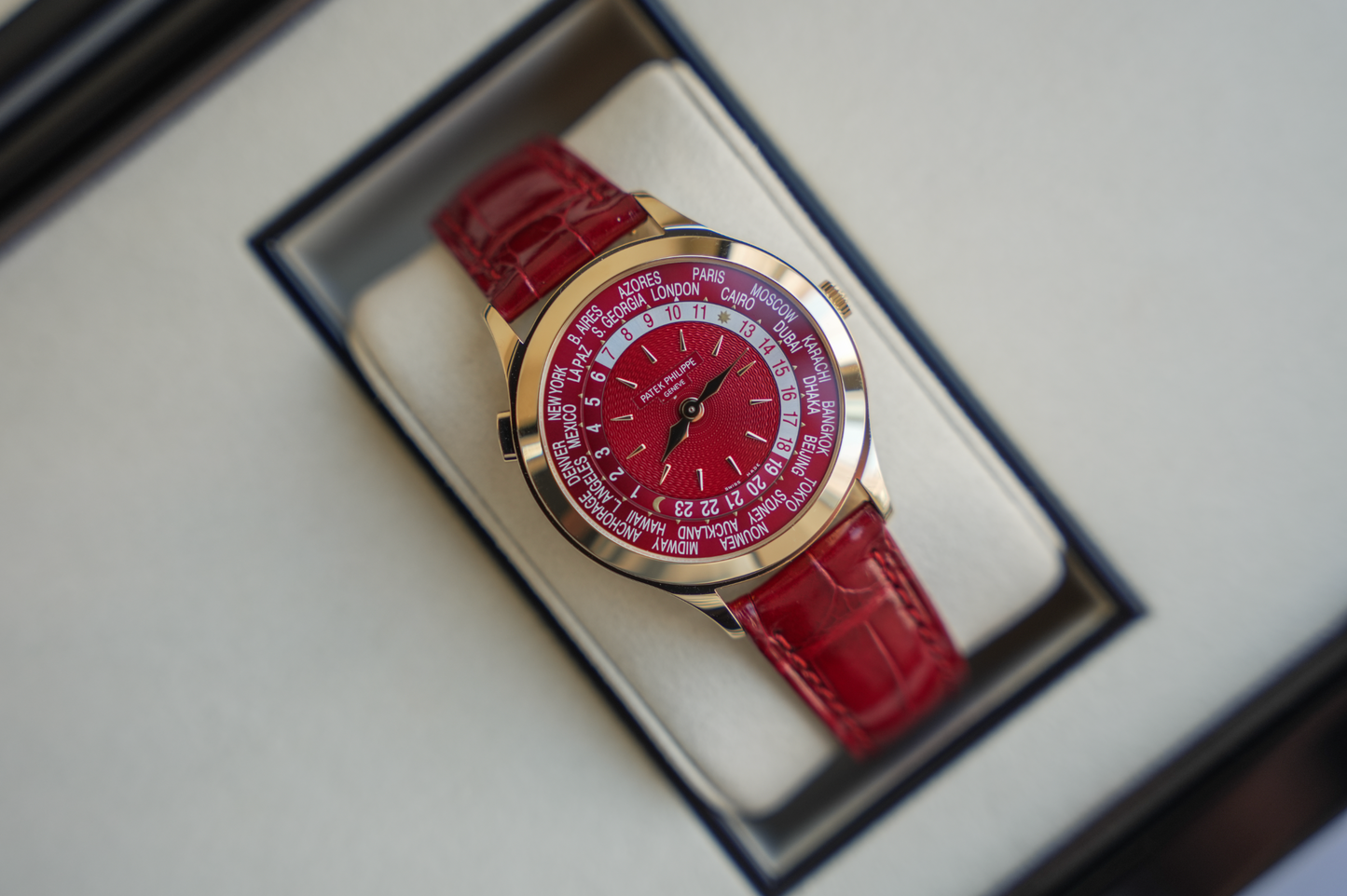Patek Philippe Complications World Time 7129J-001 18K Yellow Gold Carmine Red Dial