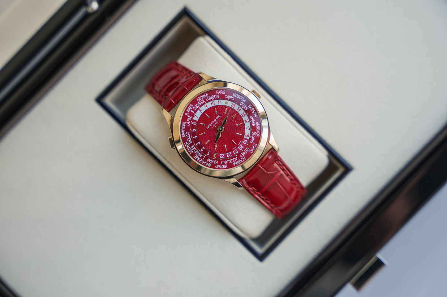 Patek Philippe Complications World Time 7129J-001 18K Yellow Gold Carmine Red Dial