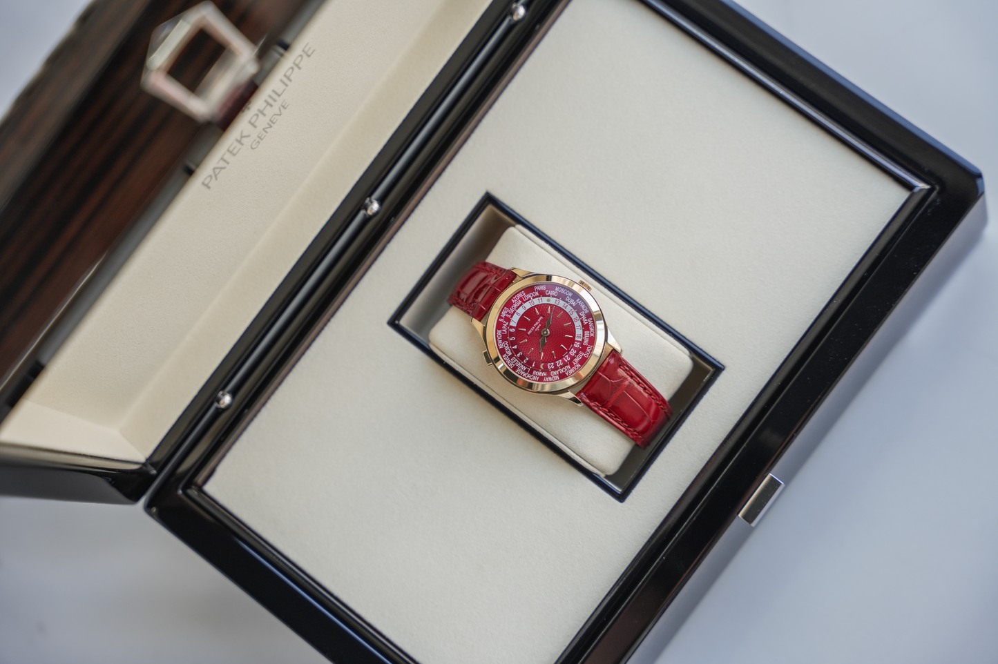 Patek Philippe Complications World Time 7129J-001 18K Yellow Gold Carmine Red Dial