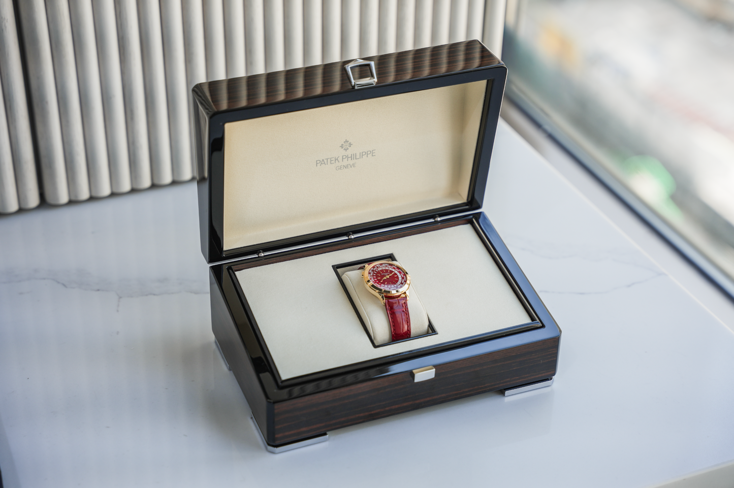 Patek Philippe Complications World Time 7129J-001 18K Yellow Gold Carmine Red Dial